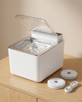Whiskl wireless stainless steel pet fountain with three replacement filters and Type-C charging cable
